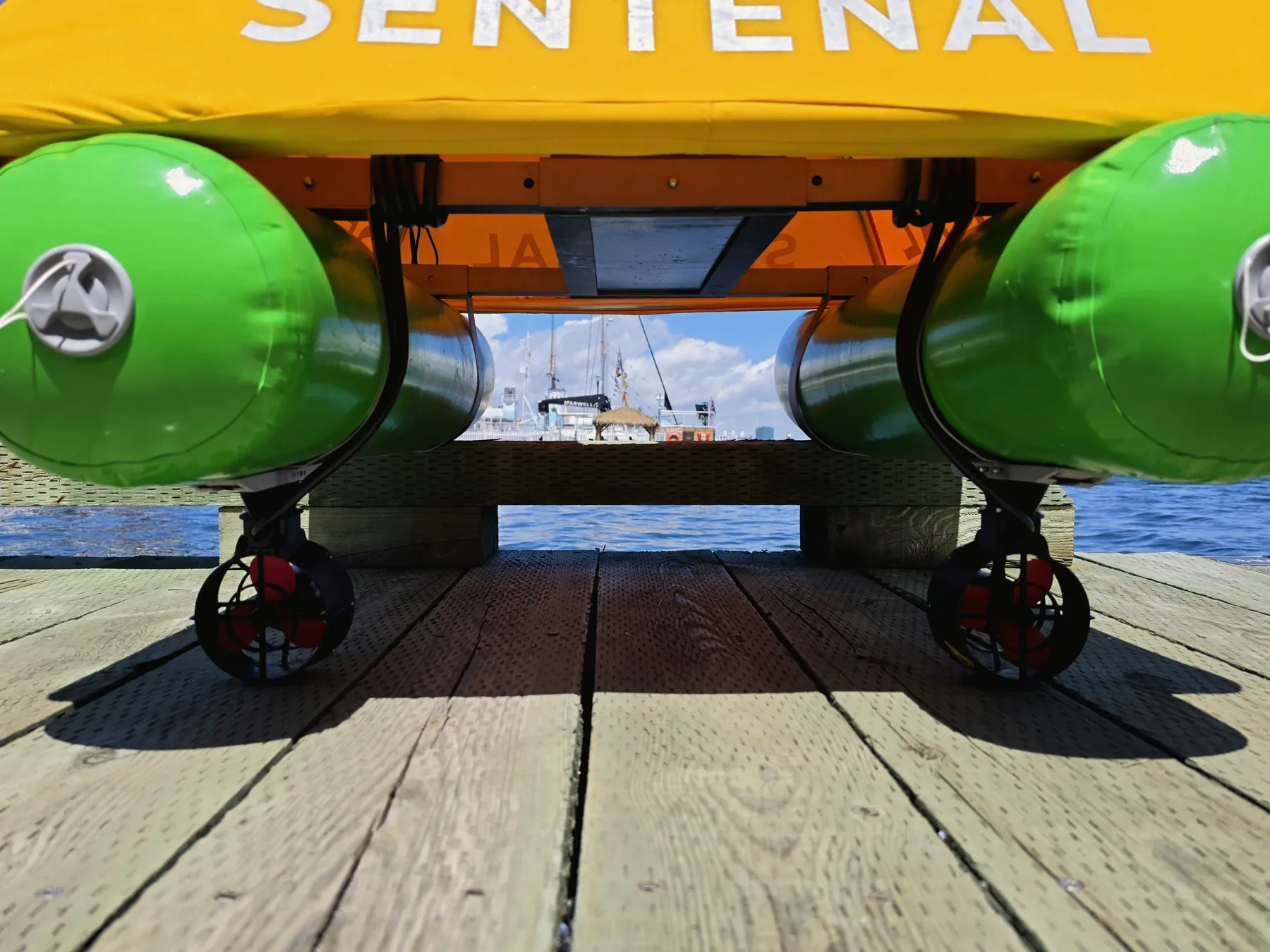 Underneath a Sentenal: two hulls and two protected thrusters